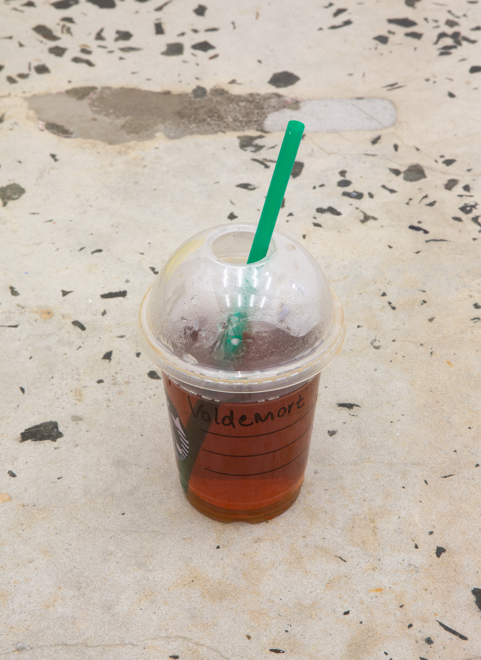 Puppies Puppies “Voldemort's Starbucks Tea”, 2014, Starbucks iced black tea ordered under the name Voldemort, plastic cup, black tea, dimensions variable