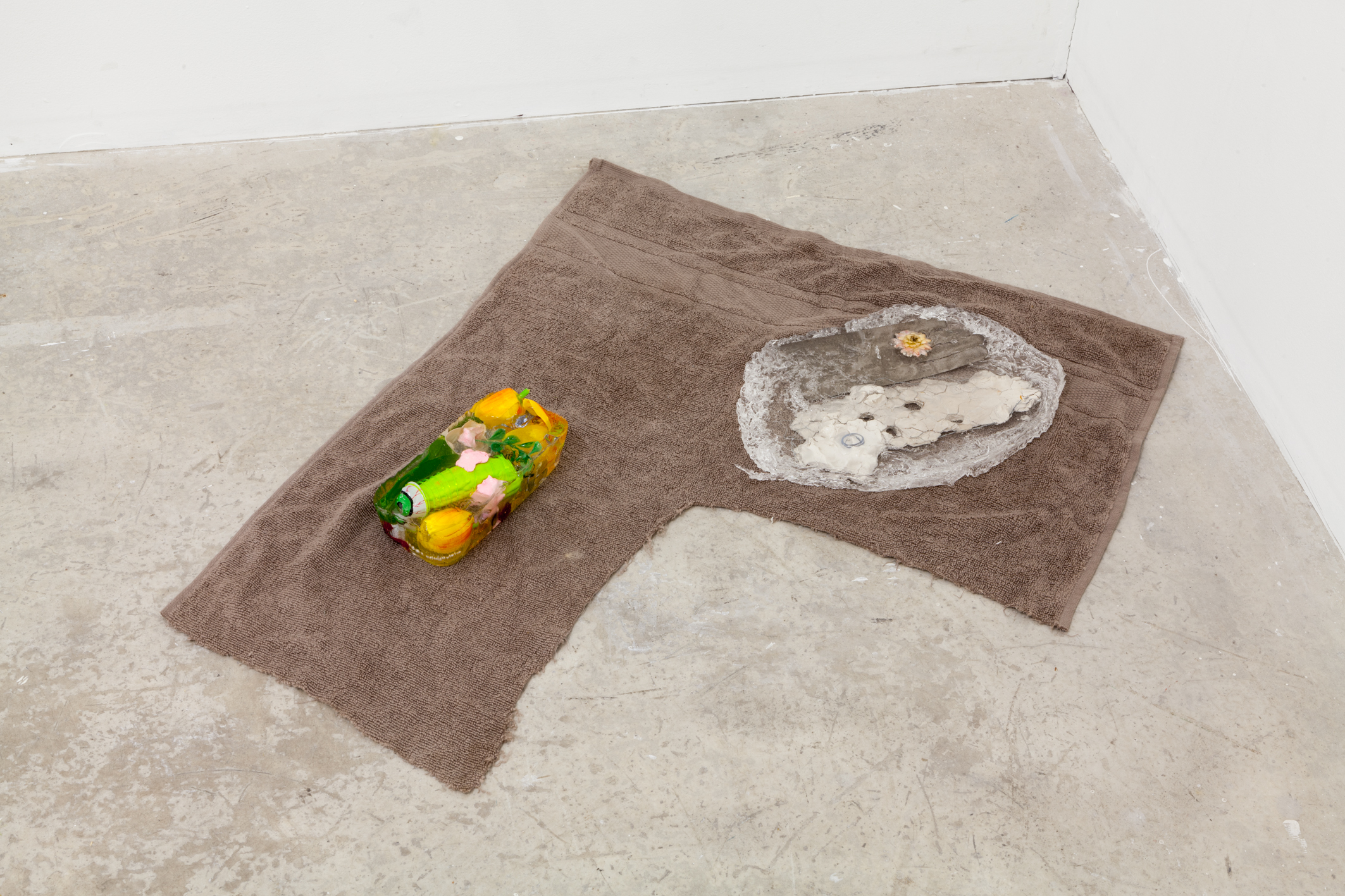 Marian Tubbs, “messmates”, 2015, found materials, breakable glass and towel, dimensions variable
